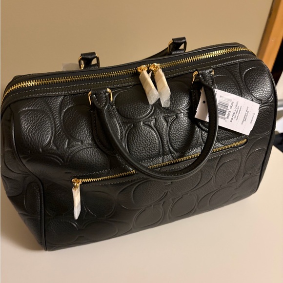 Coach Rowan - Picture 2 of 5